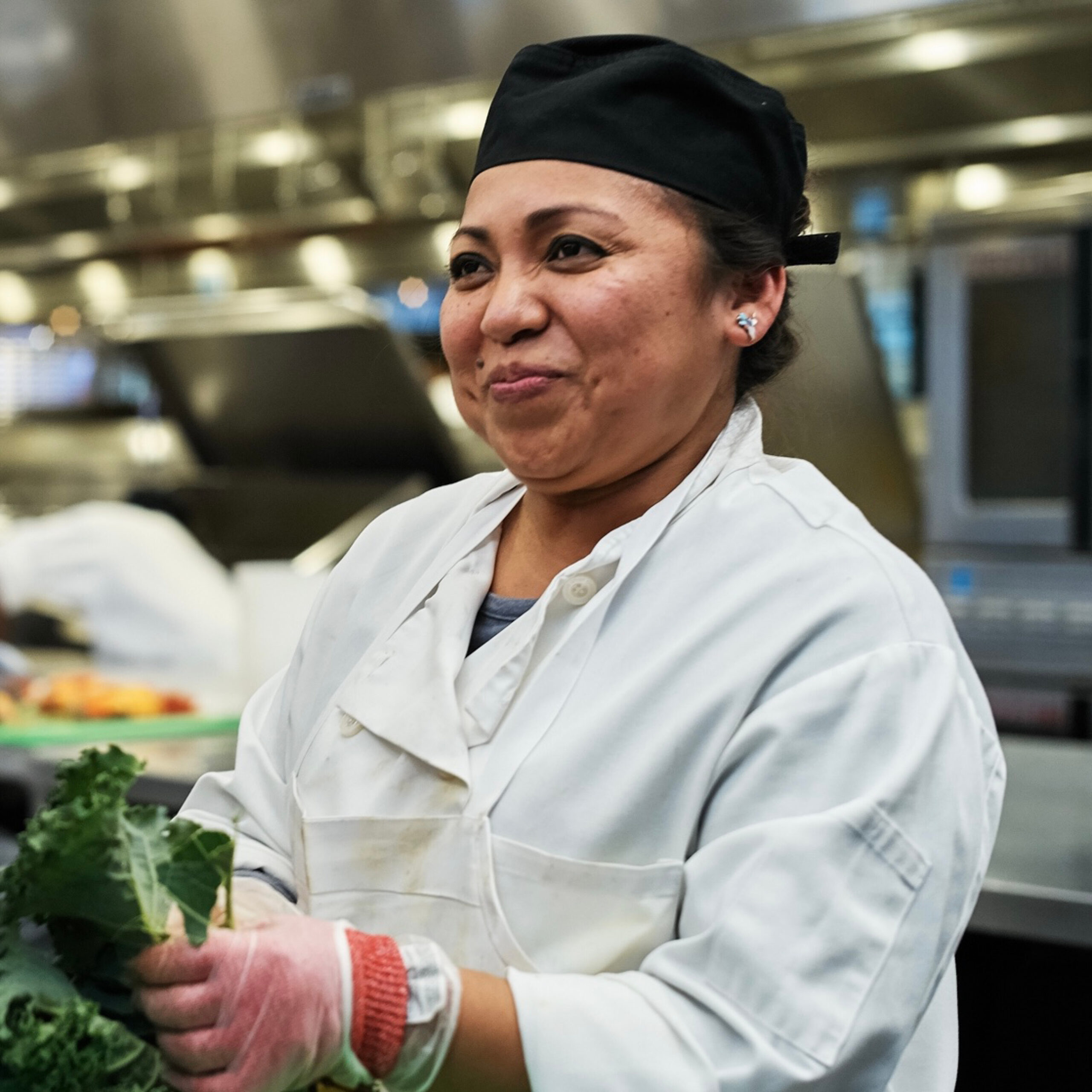 picture of female cook with produce
